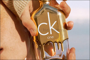 ck one gold - be bold. stand out. everything you touch drips with gold.